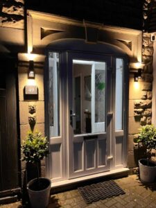 Exterior front door lighting installation by Sunrise Electrical in Gloucester, Gloucestershire, improving safety, security and kerb appeal.