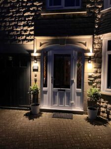 Exterior front door lighting installation by Sunrise Electrical in Gloucester, Gloucestershire, improving safety, security and kerb appeal.